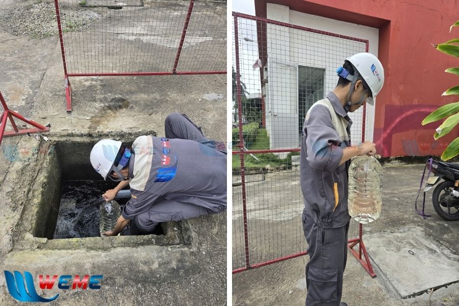 Nhân công lấy mẫu nước thải để đi kiểm tra đánh giá